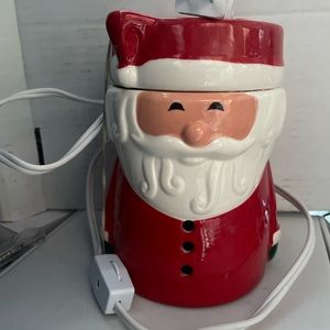Like new (used once) Santa Claus wax warmer